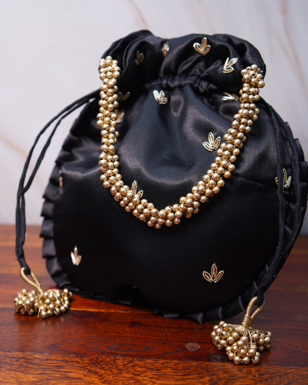 Obsidian Black With Gold Silk Embroidered Potli Bag (With Handle)