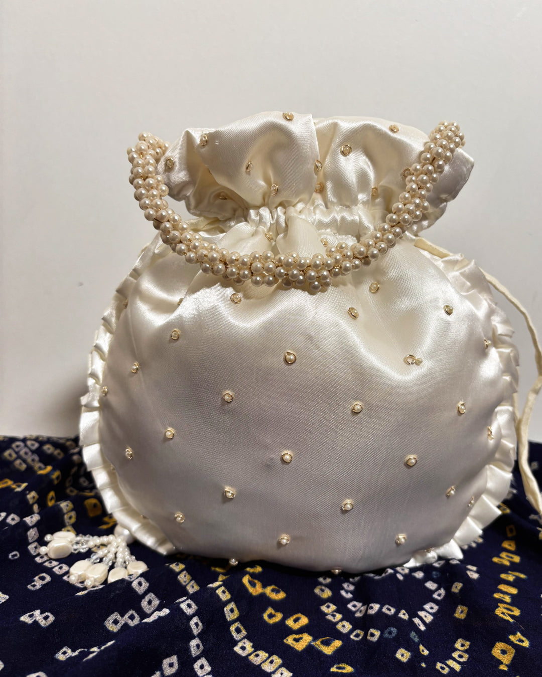 Silken White Silk Embroidered Potli Bag (With Handle)